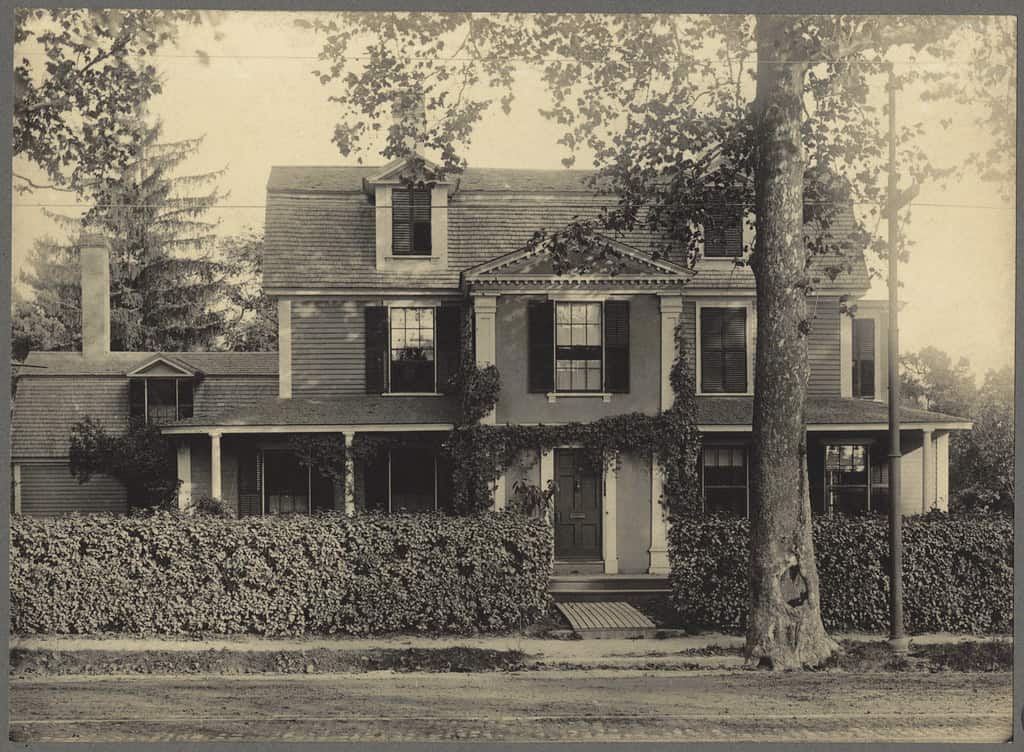 A black and white photo of a historic house in Jamaica Plain, Boston. 