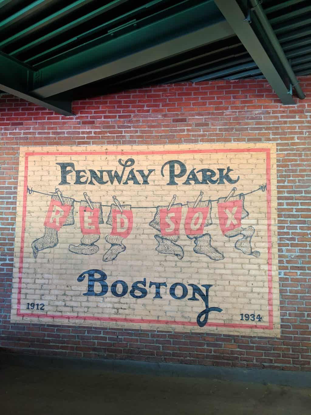 A historic mural on a brick wall inside Fenway Park, Boston. 
